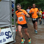 Europameister Thomas Ruminski bei einer Überrundung (beim Söltjerlauf 2014)